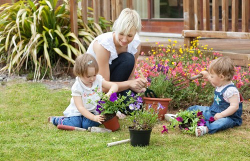 Professional gardener trimming hedges in Mayfair