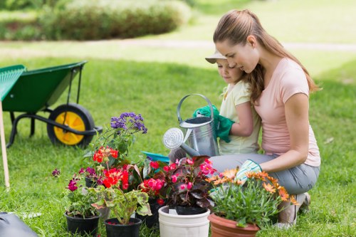 Seasonal garden maintenance activities in a Mayfair residential garden